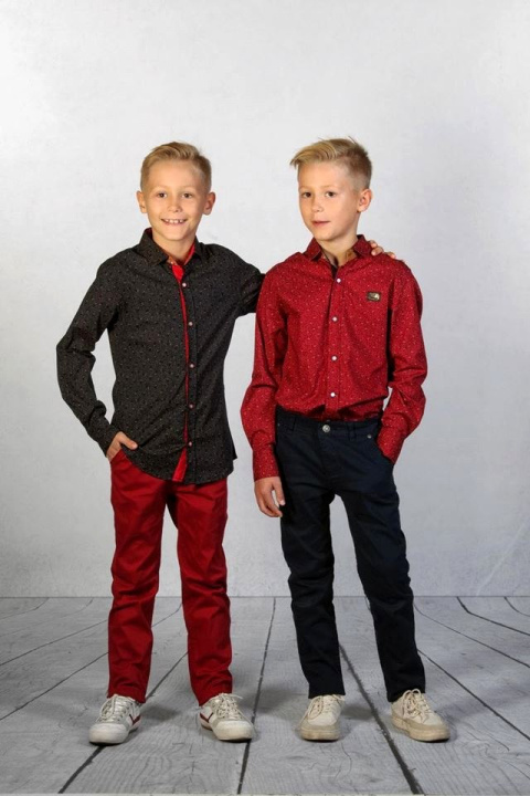 Elegancka czarna koszula w musztardowy deseń z taśmą na plecach Elegancka czarna koszula w musztardowy deseń z taśmą na plecach