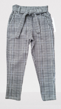 Elegantly sports a shepherd's Plaid pants with decorative bow