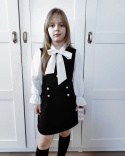 Elegancka czarno biała sukienka 2w1 z efektowną kokardą