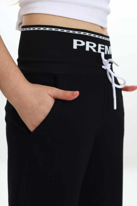 Spodnie dresowe PREMIUM z ozdobną taśmą w talii - czarne Spodnie dresowe PREMIUM z ozdobną taśmą w talii - czarne